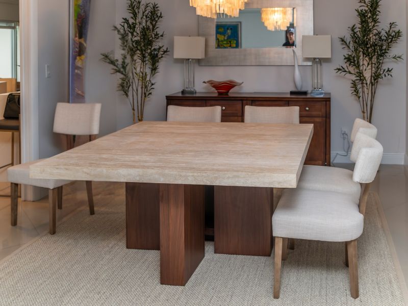 Travertine dining table elegant luxury home Miami Florida